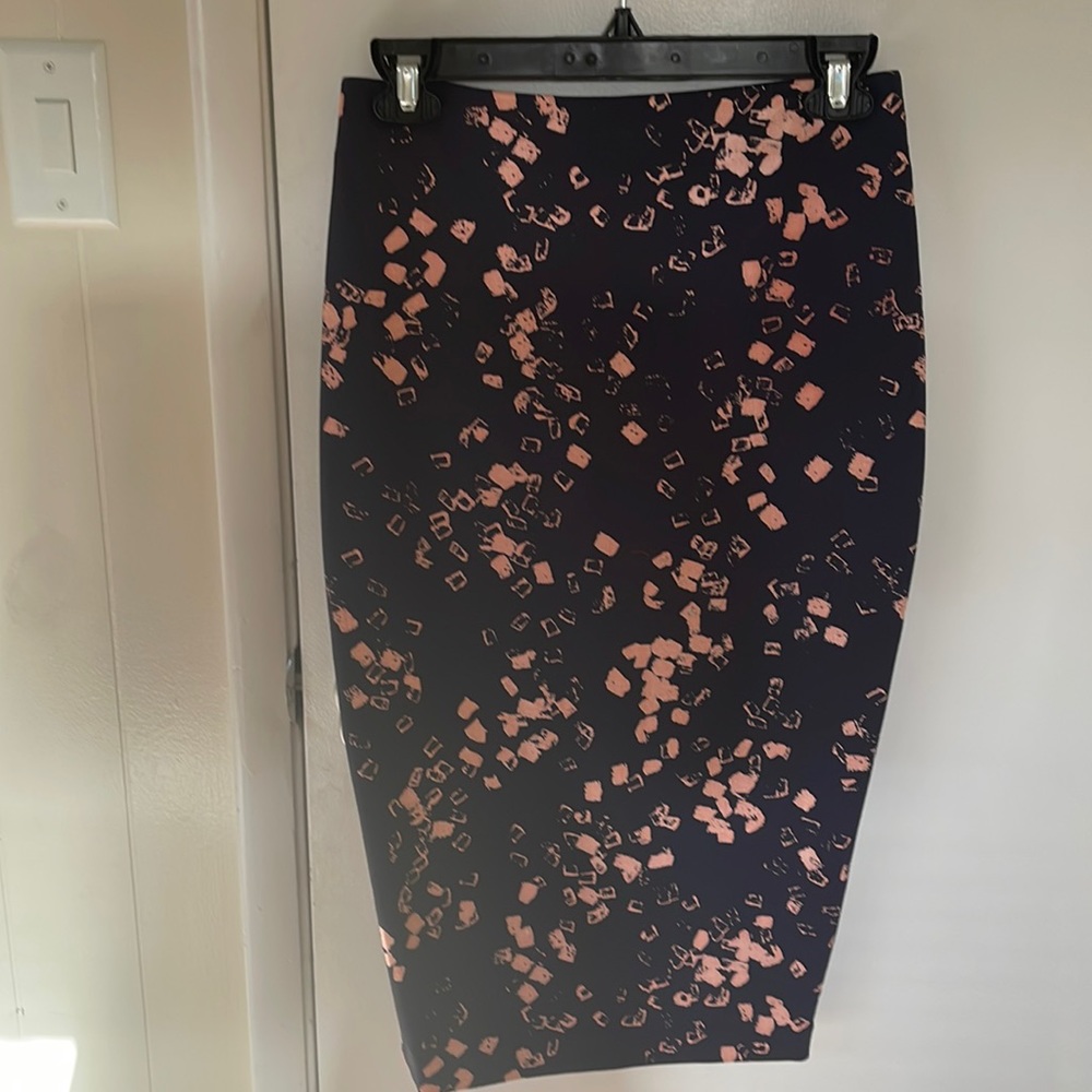 Elizabeth and James~Fitted skirt, accentuates curves